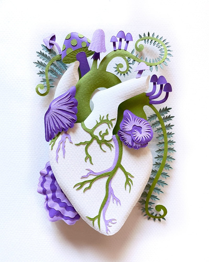 Anatomical heart with purple mushrooms made of hand cut paper