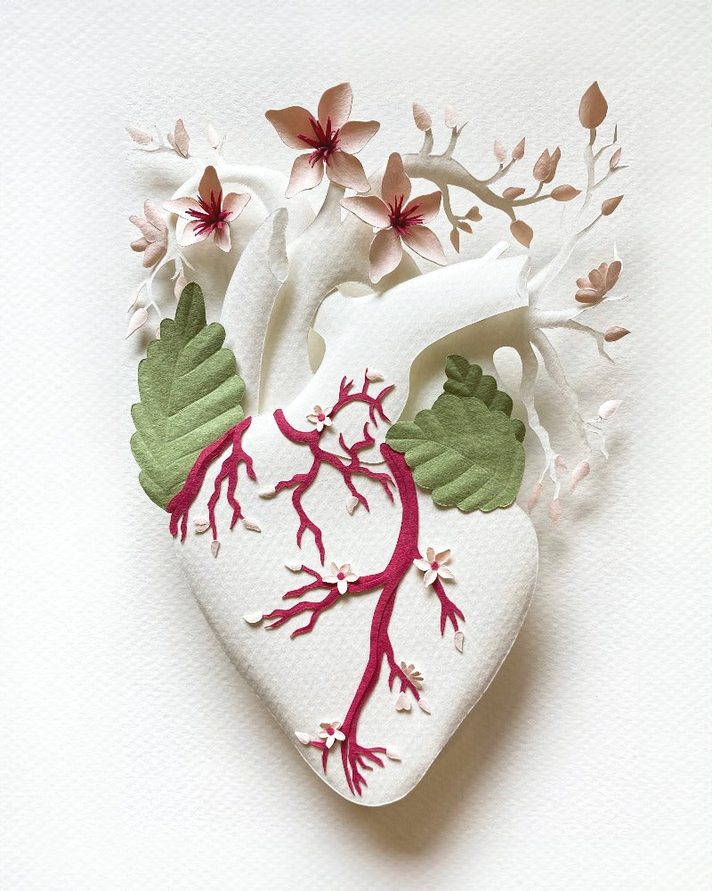 anatomical heart with cherry blossoms made of hand cut paper