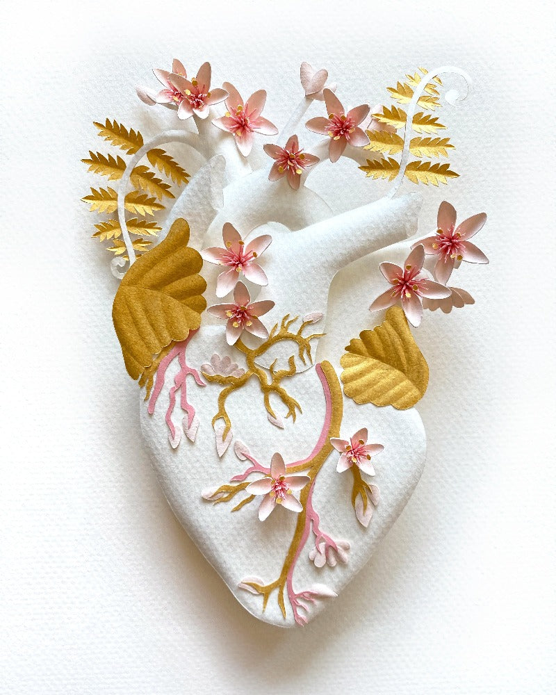 Anatomical heart with cherry blossoms and golden leaves made of hand cut paper