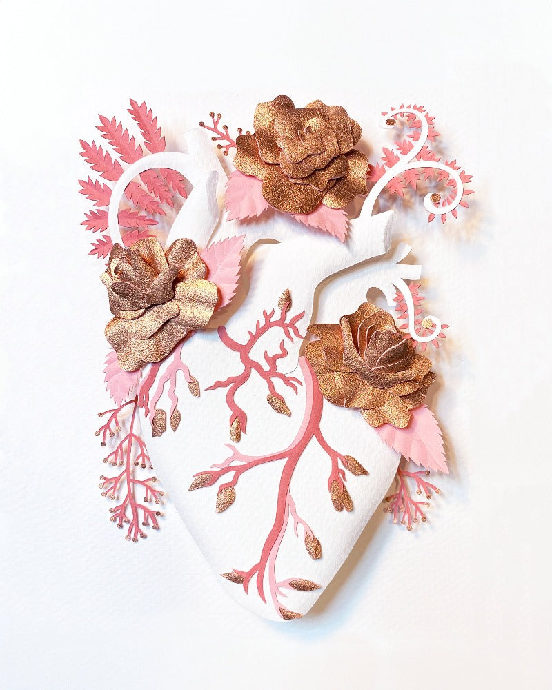 anatomical heart with roses made of hand cut paper
