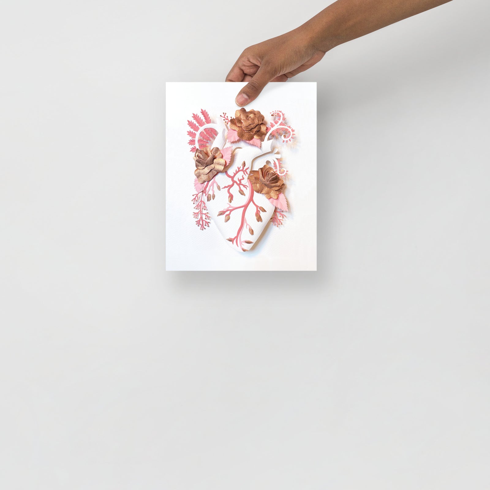 anatomical heart with roses made of hand cut paper
