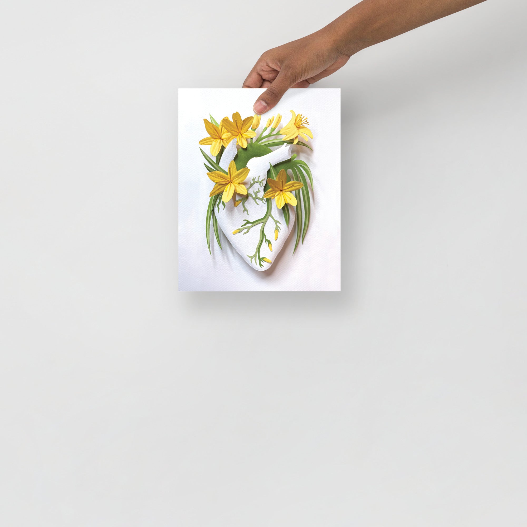 Anatomical heart with yellow daylilies made of hand cut paper