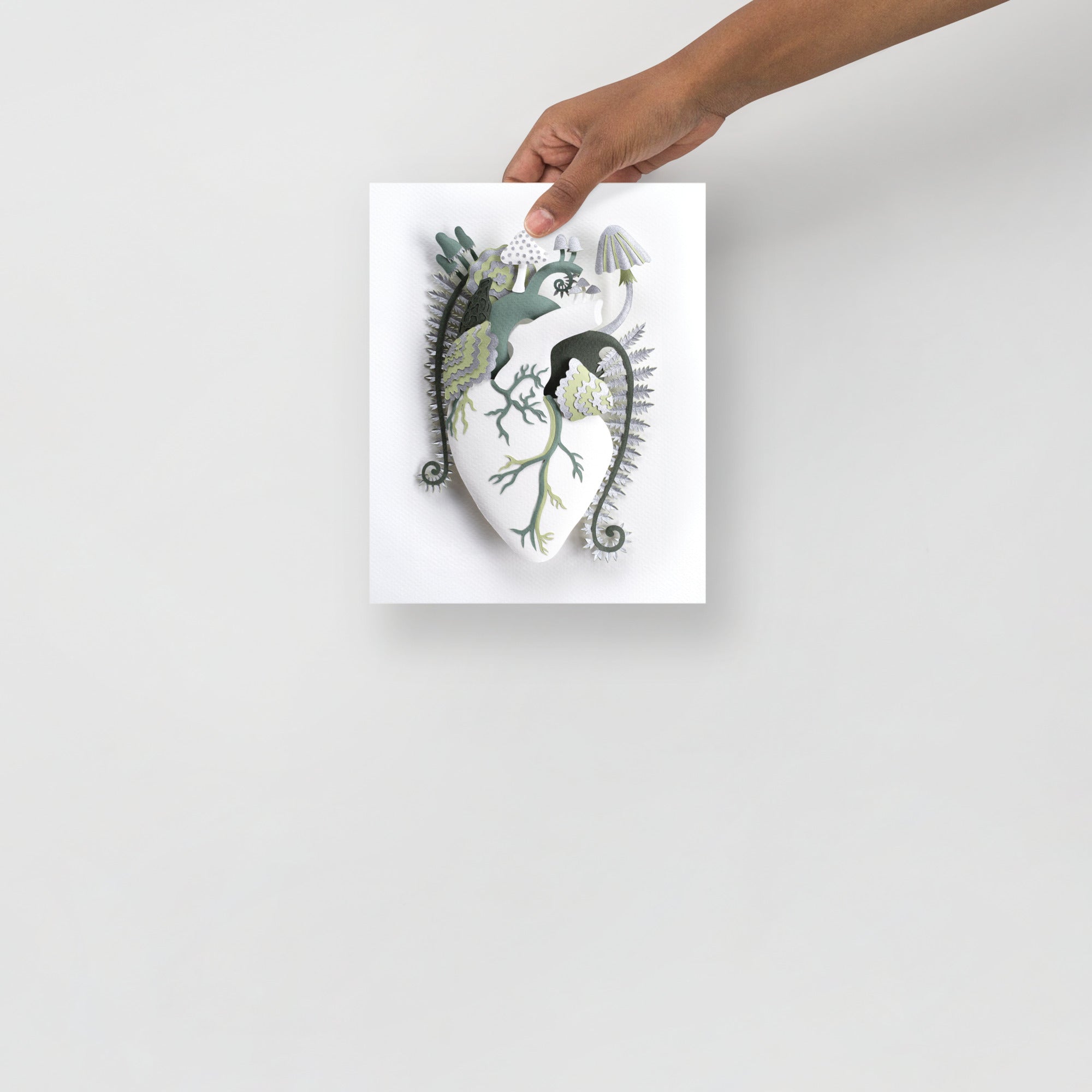 Anatomical heart with mushrooms and ferns made of hand cut paper