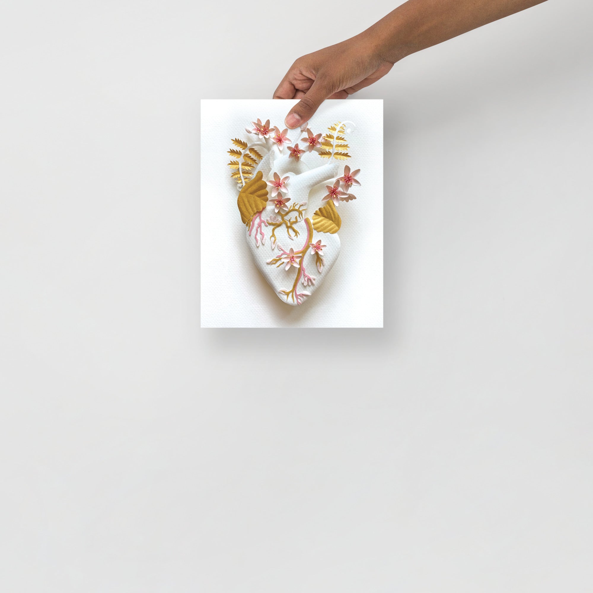 Anatomical heart with cherry blossoms and golden leaves made of hand cut paper