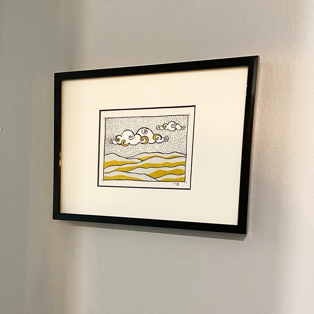 Gold, silver and black ink drawing on paper. Clouds and hills mountains. Tiny art.