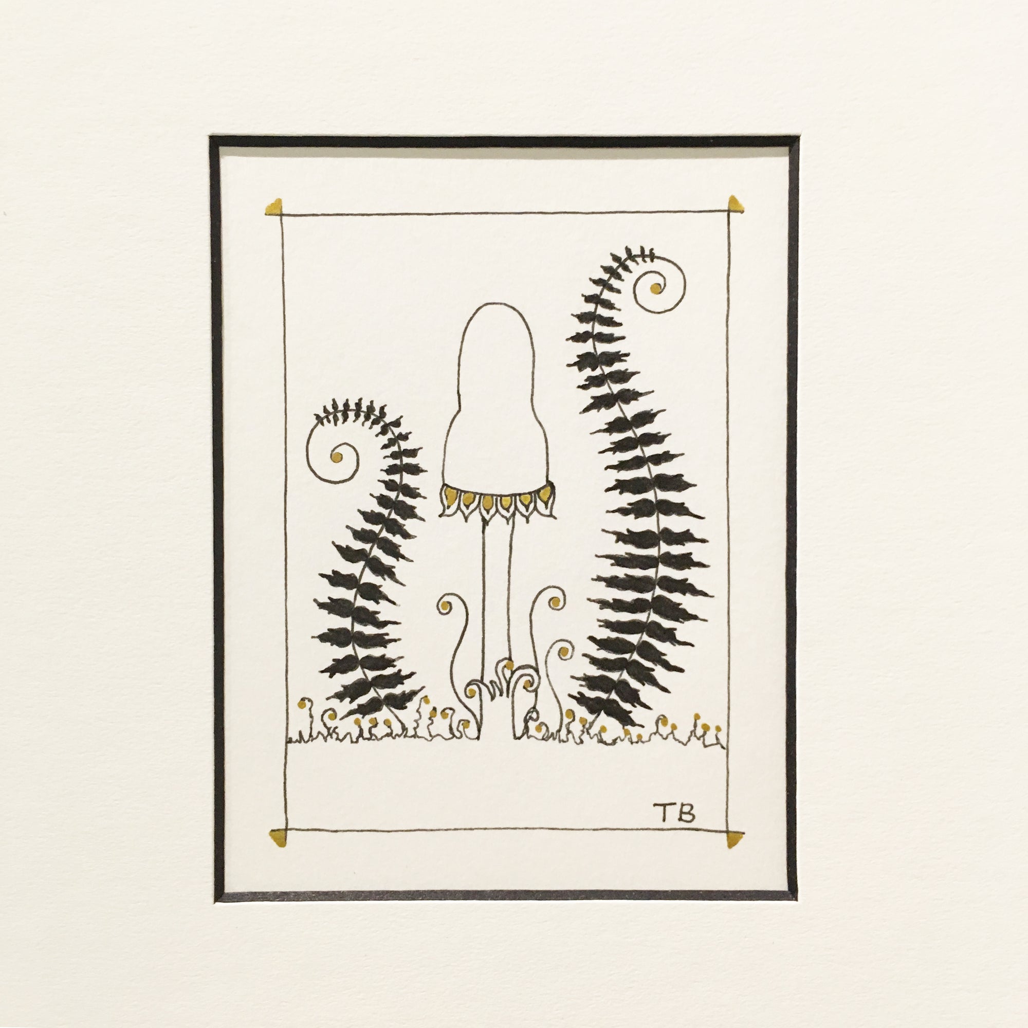 Pen and ink drawing with black and gold ink. mushroom and two ferns on each side reminiscent of a Greek Lyre instrument.